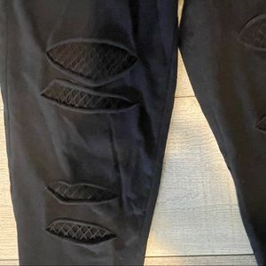 SOLD!!!- Premium Black Torrid Leggings Size 2 Slashed and netted SUPER CUTE!